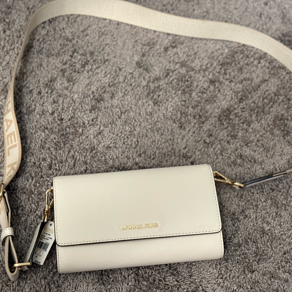 Micheal Kors 
Crossbody